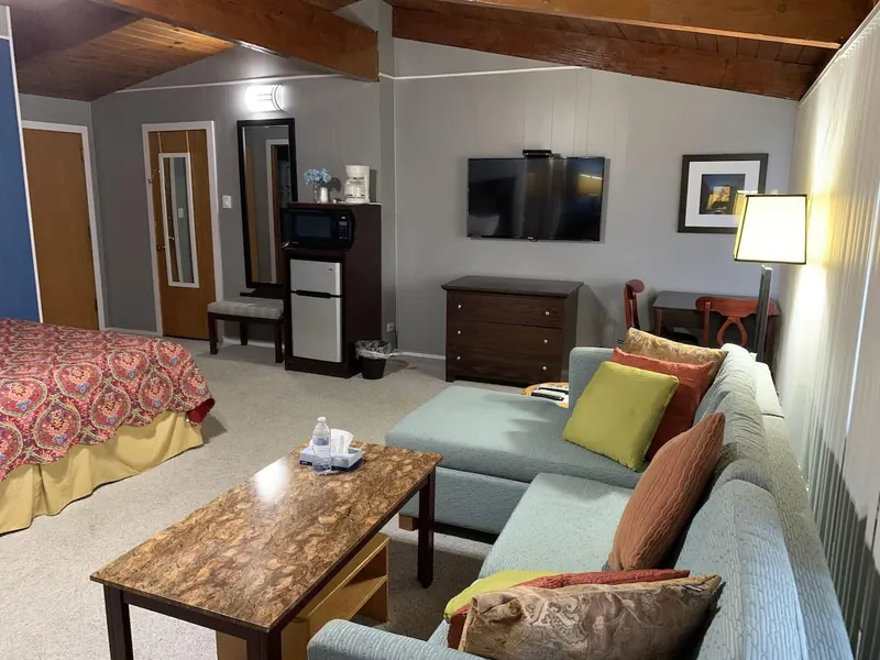 Family suite sitting area with a sofa and coffee table